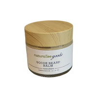 Jar of Goode Beard Balm with a wooden lid on a white background